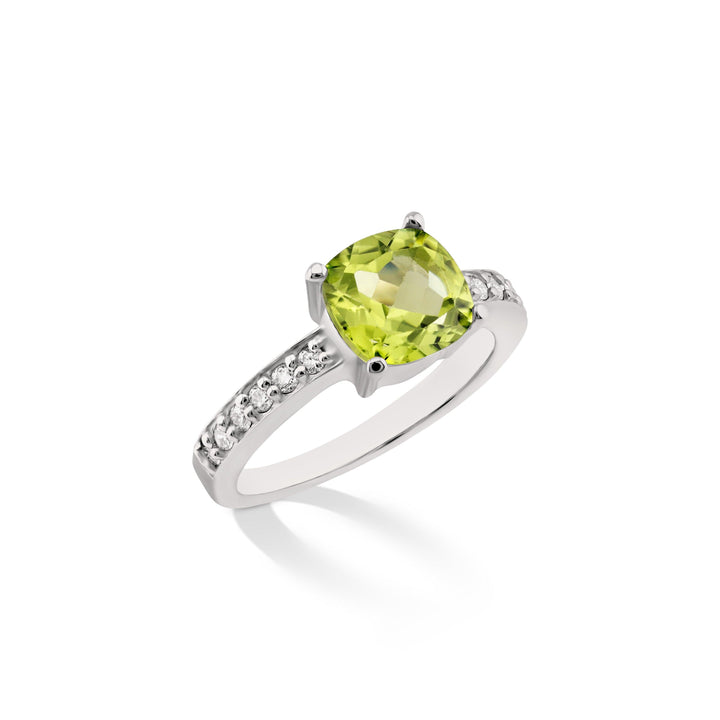 Side view of the sterling silver ring with a peridot centerpiece and diamond accents, showcasing its elegance. CHC Fine Jewelry.