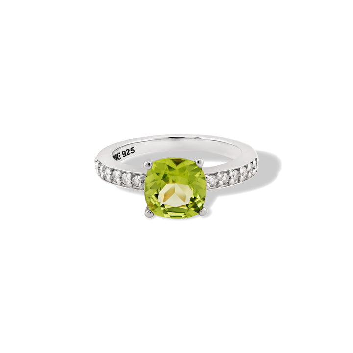 Elegant sterling silver peridot and diamond ring with a delicate 2mm band, perfect for any special occasion. CHC Fine Jewelry.