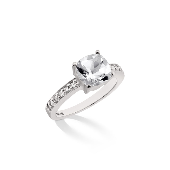 Side view of the sterling silver ring with a white topaz centerpiece and diamond accents, showcasing its elegance. CHC Fine Jewelry.