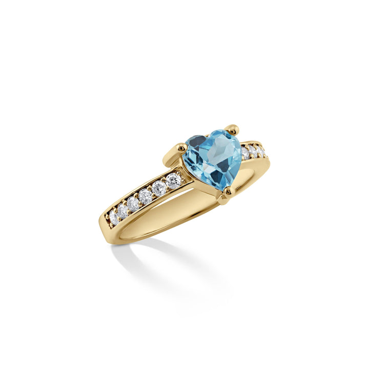 Side view of heart-shaped blue topaz and diamond ring in 14k yellow gold, CHC Fine Jewelry